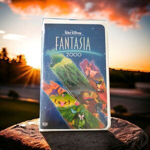 ‎New Fantasia 2000 VHS Movie With Commemorative Booklet Walt Disney Clamshell.